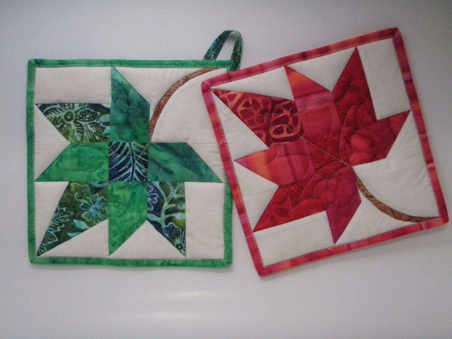 Pair of Maple Leaf Patchwork Pot Holders in Red and Green Batiks
