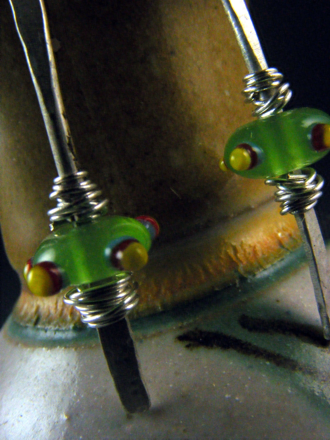 Green Flameworked Glass earrings on silver wire by Barkingdoggallery