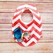 Coral chevron baby bib with turquoise flowers