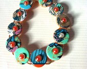 NEW  Itty Bitty Bracelet Nectarine and Teal