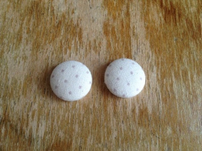 Cream with tiny tan dots.  Spring has sprung