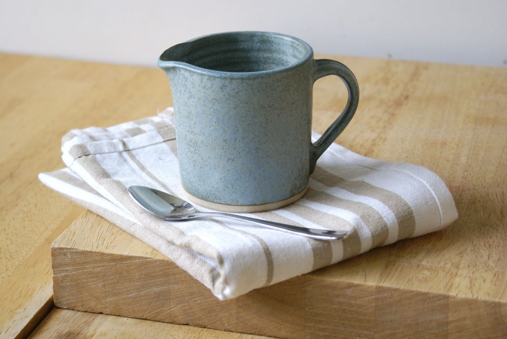 A little stoneware milk jug - hand thrown in stoneware and glazed in smokey blue