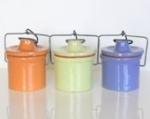 Three Adorable Vintage Ceramic Canister Jars in Orange, Green, and Blue with Locking Lids by Uptown Vintage