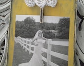Adorable Mustard Yellow Distressed Wood Board Frame Embellished with White Flowers and Mini Clothespin