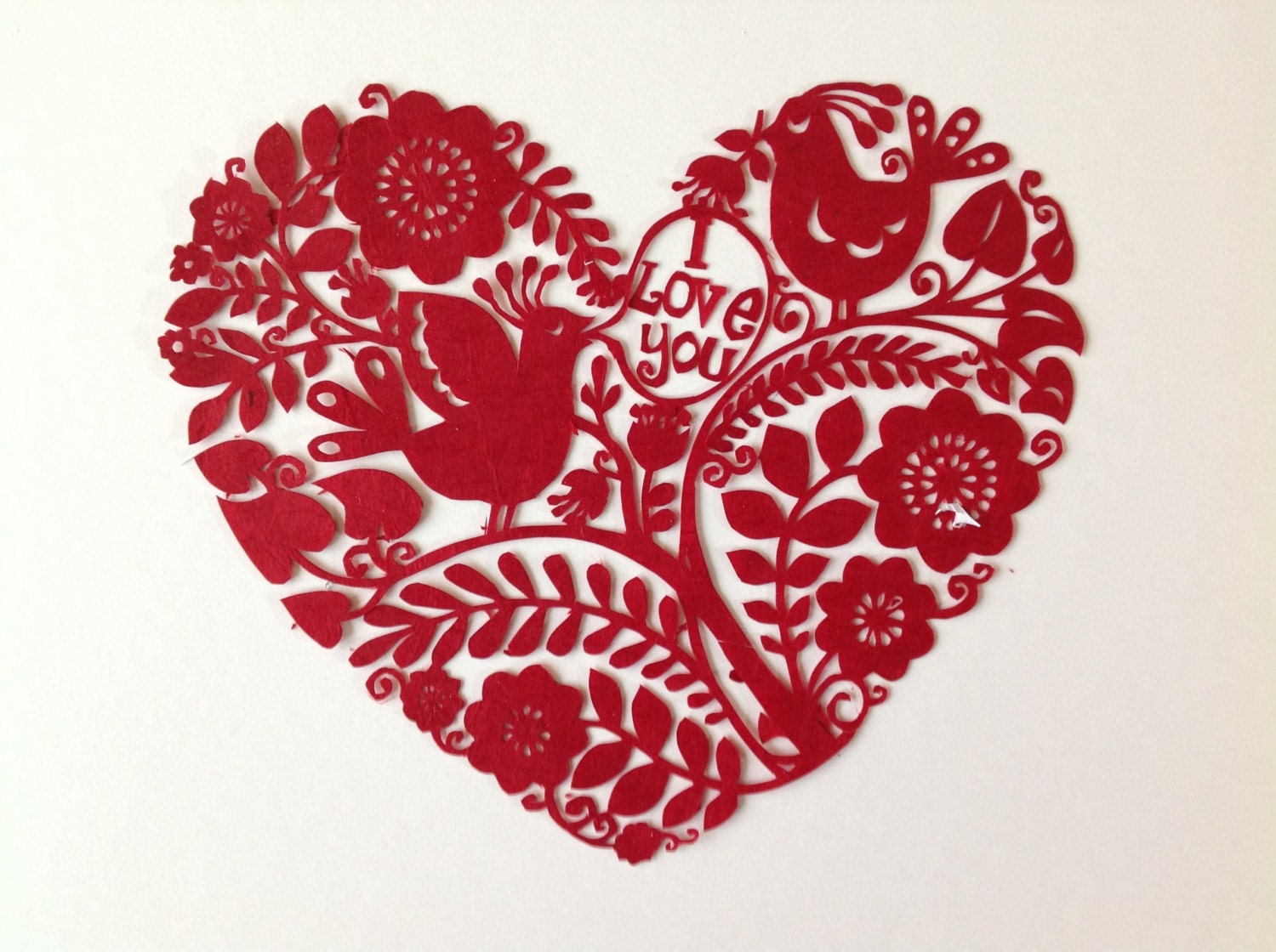 Heart with bird