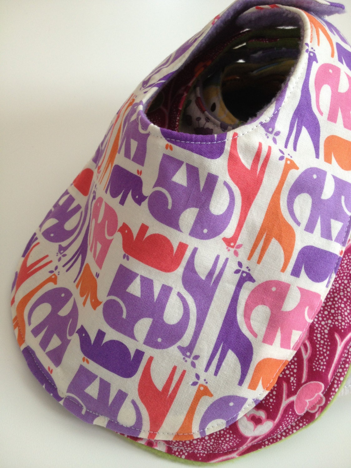 Small Bib in Purple Pink Elephants with Purple Fleece Backing