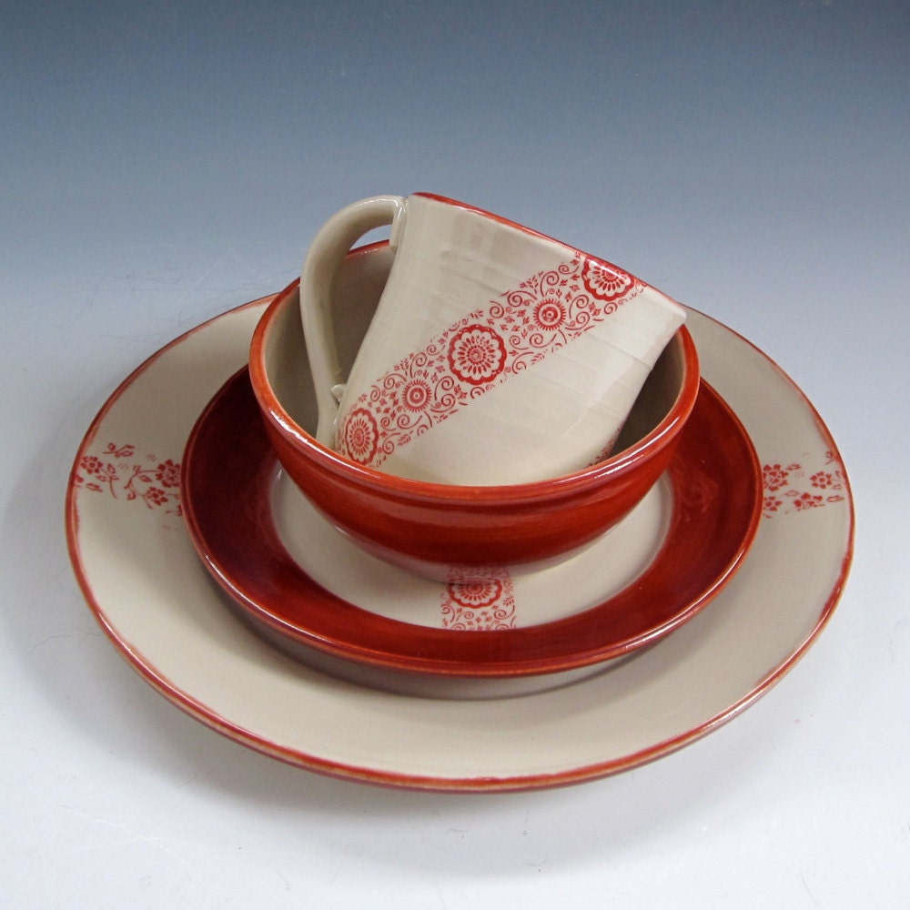 Pottery Place Setting with Delicate Stripes of Flowers
