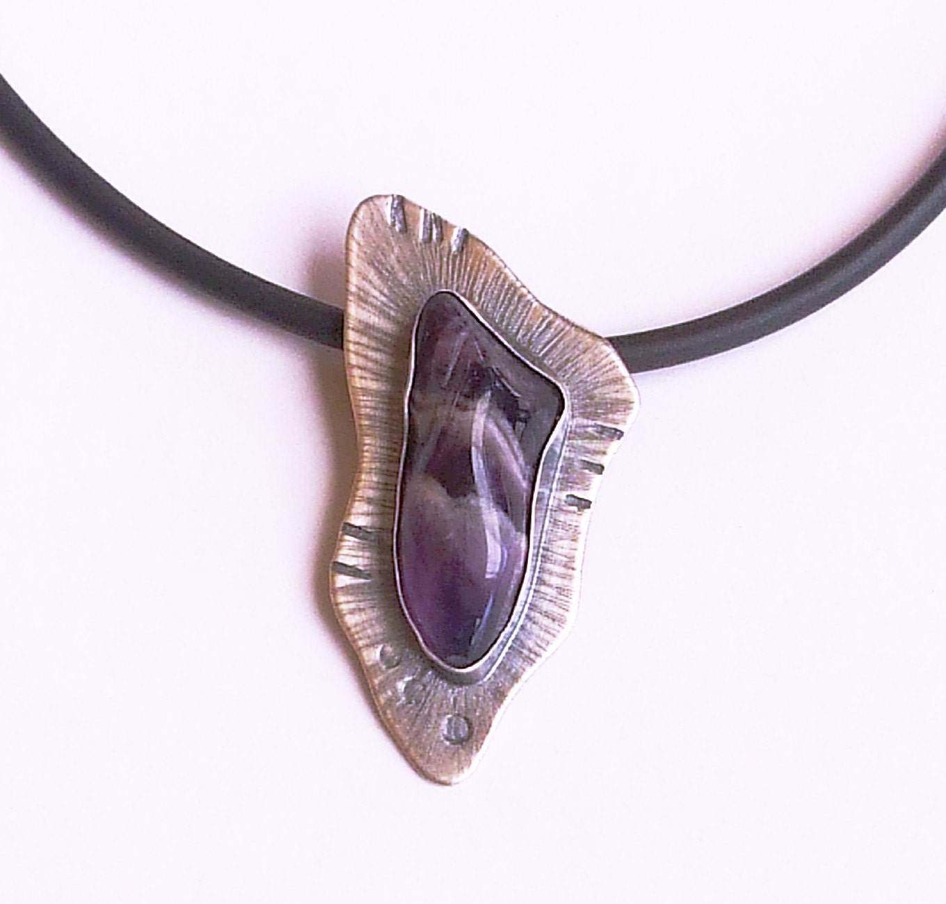 Sterling silver textured pendant with free form Amathyst stone. FREE SHIPPING WORLDWIDE.