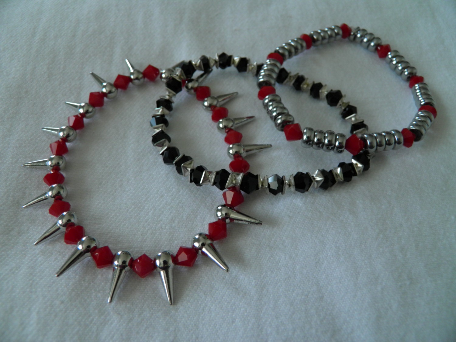 Red Black and Metal Bracelets