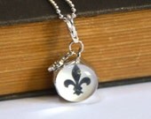 3/4 Inch Marble Bubble Glass Soldered Charm Pendant with Fluer di Lis and Churchill Downs with 30 Inch Ball Chain