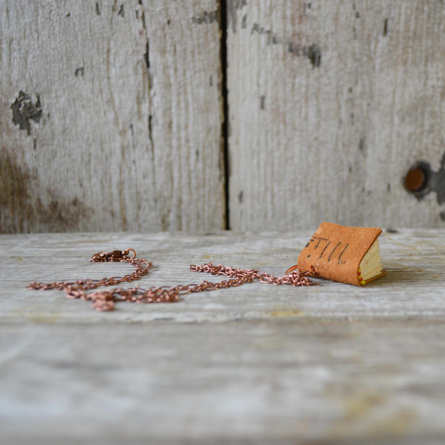 Book necklace: OOAK Miss, postcard early 1900s, leather, letters, medium.