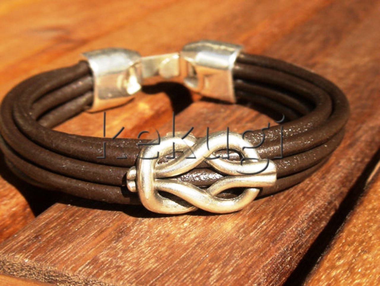 women brown leather bracelet with cute sterling silver plated knot spacer