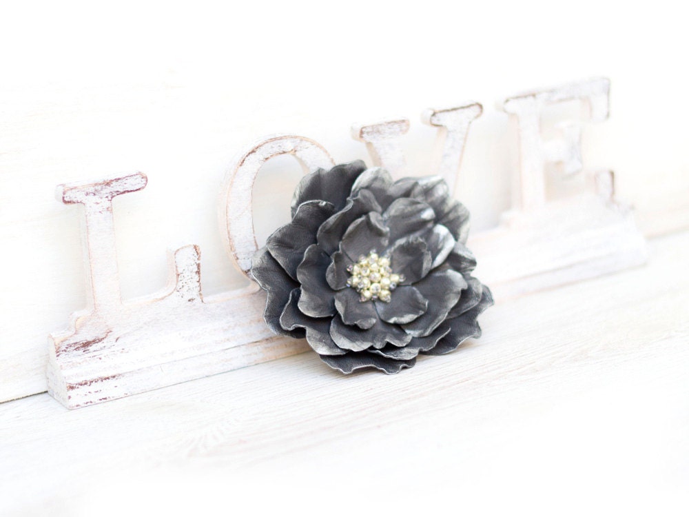 Grey leather flower brooch