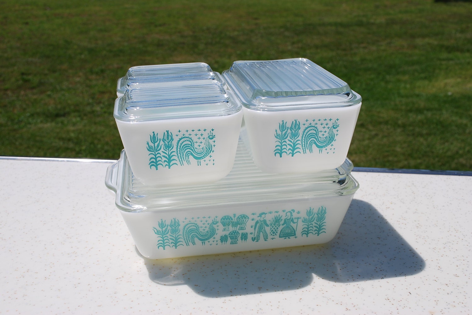 Four Dish Set of Pyrex Amish Butterprint Fridge Dishes
