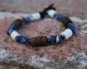 Poseidon's Adventures - 8 In. Bracelet - Hematite, Sodalite, Wood & Sea Shell - Handmade Gemstone Jewelry for Men, Women, Unisex Teens