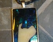 Pitbull silohuette mosaic pendant  with iridescent blues background