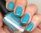 Nail polish - "The Fifth Element"  turquoise and orange glitter in a turquoise blue base