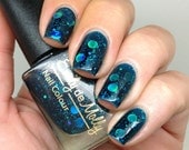 Nail polish - "Oceanic Forces" holographic dot glitter in a dark teal base