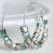 Green & Purple Hoop Earrings. Silver Earrings. Plum, Rose, Amethyst and Silver Aurora Borealis glass beads on silver plated hoops.