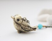 Little Birdie Locket Necklace in Antique Gold (LN-17)