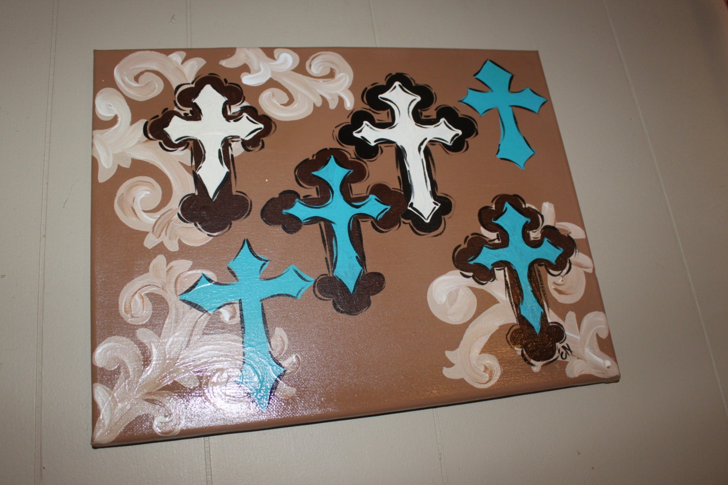 Rustic country art with brown, off white, and turquoise crosses