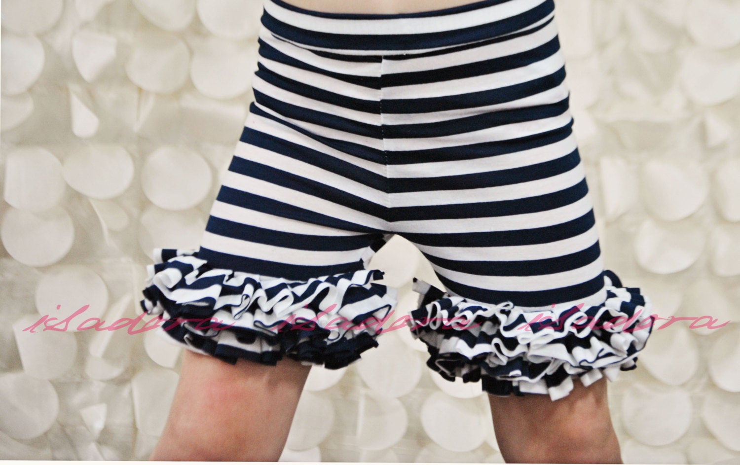 Girls ruffle shorties in Navy and white