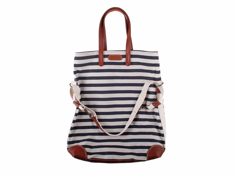 Workhorse bag in dark navy candy stripe print fabric with leather handles and base