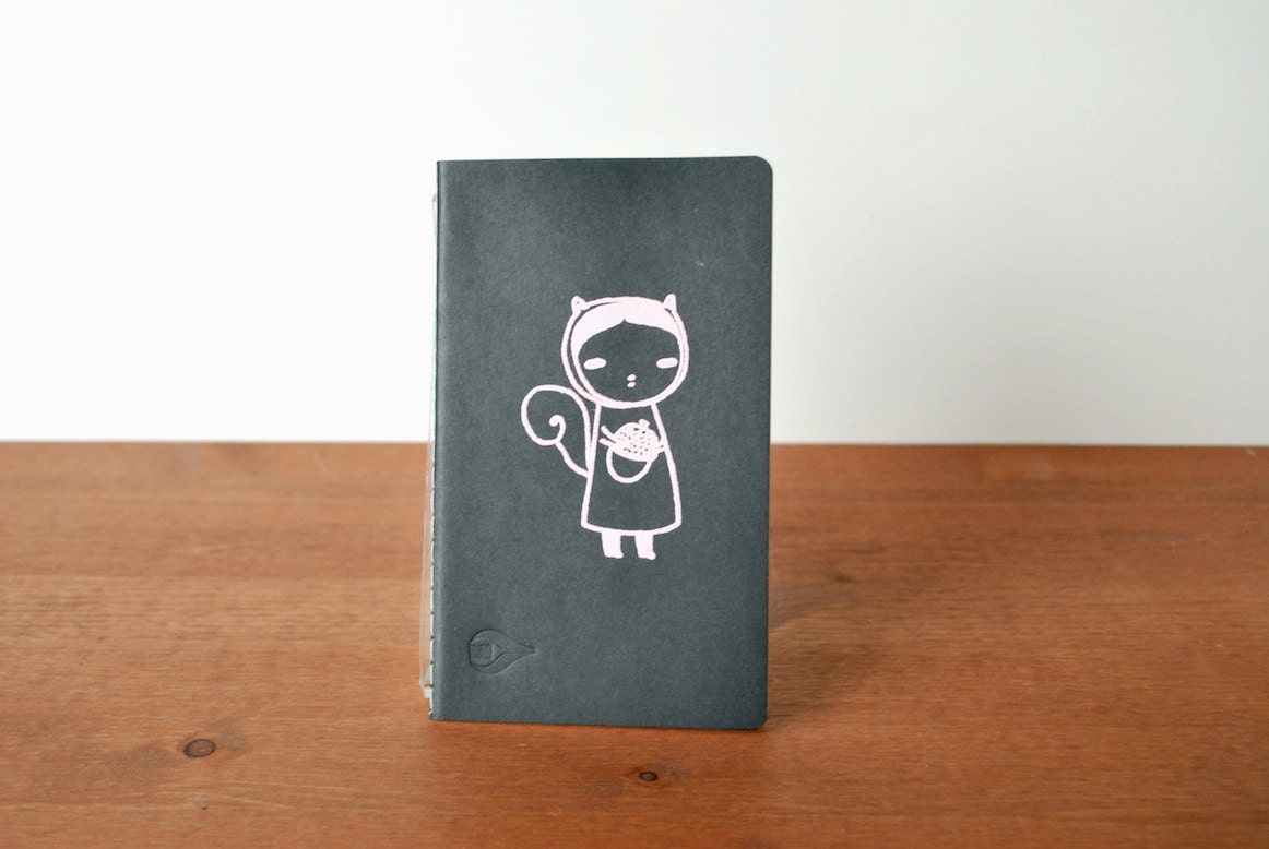 black moleskine style journal: typewriter