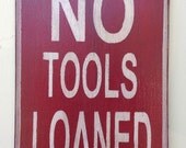 Wood sign painted NO tools loaned sign made from reclaimed plywood