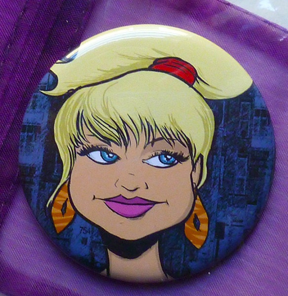 Julie, 2.25" Mirror with Colorful Organza Bag, pretty blonde girl with a ponytail & big earrings