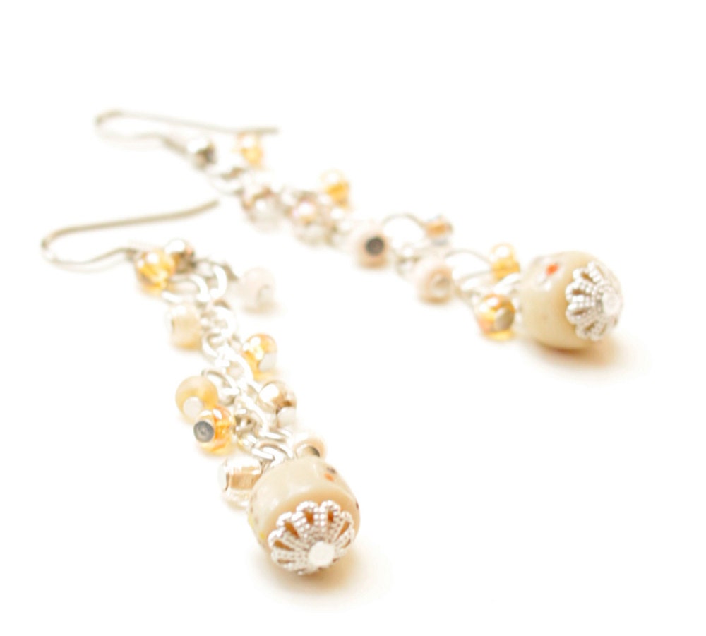 Glass Earrings. Neutral and gold-sand earrings mounted on silver plated chain.