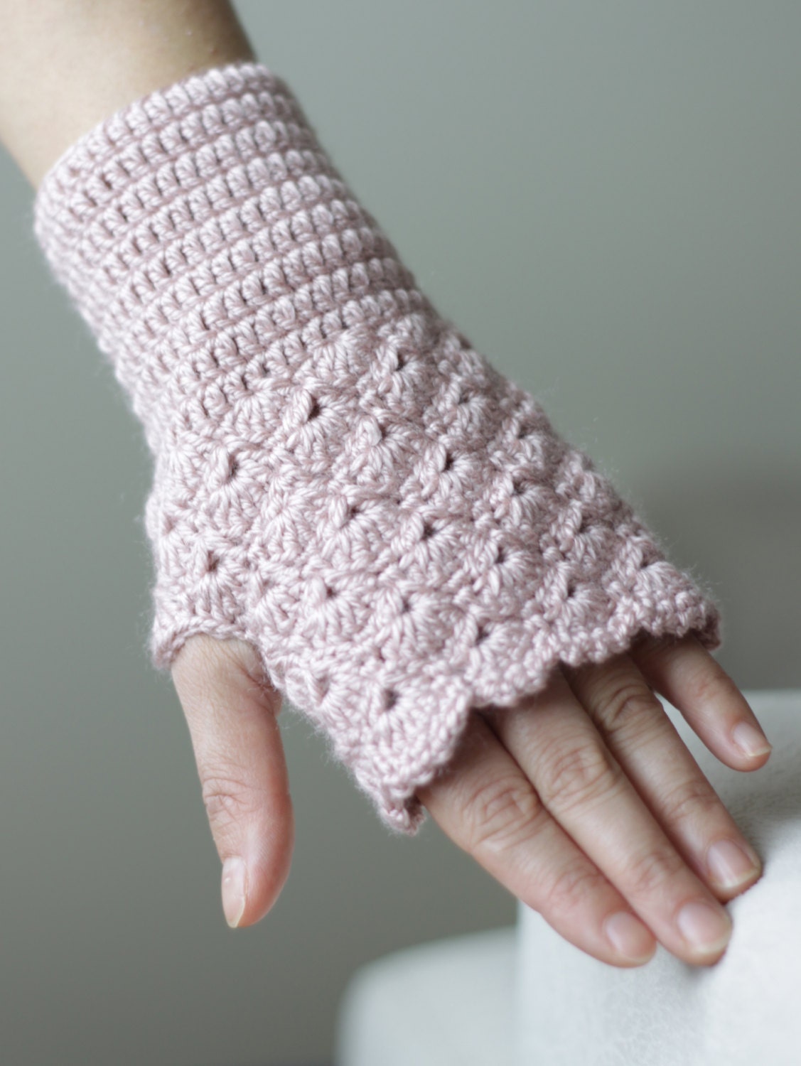 Crochet fingerless gloves in dusty rose