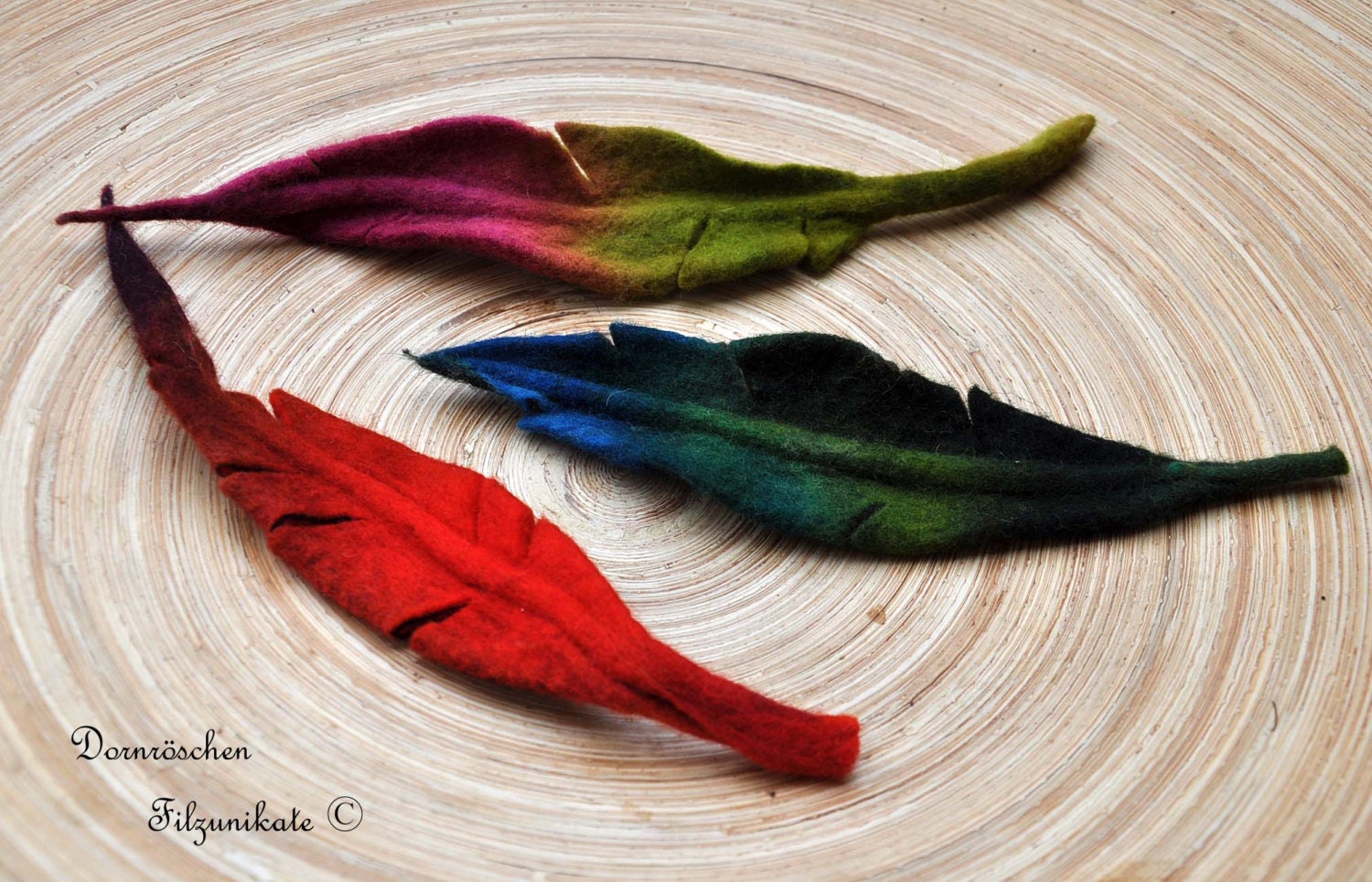 felted feather brooch