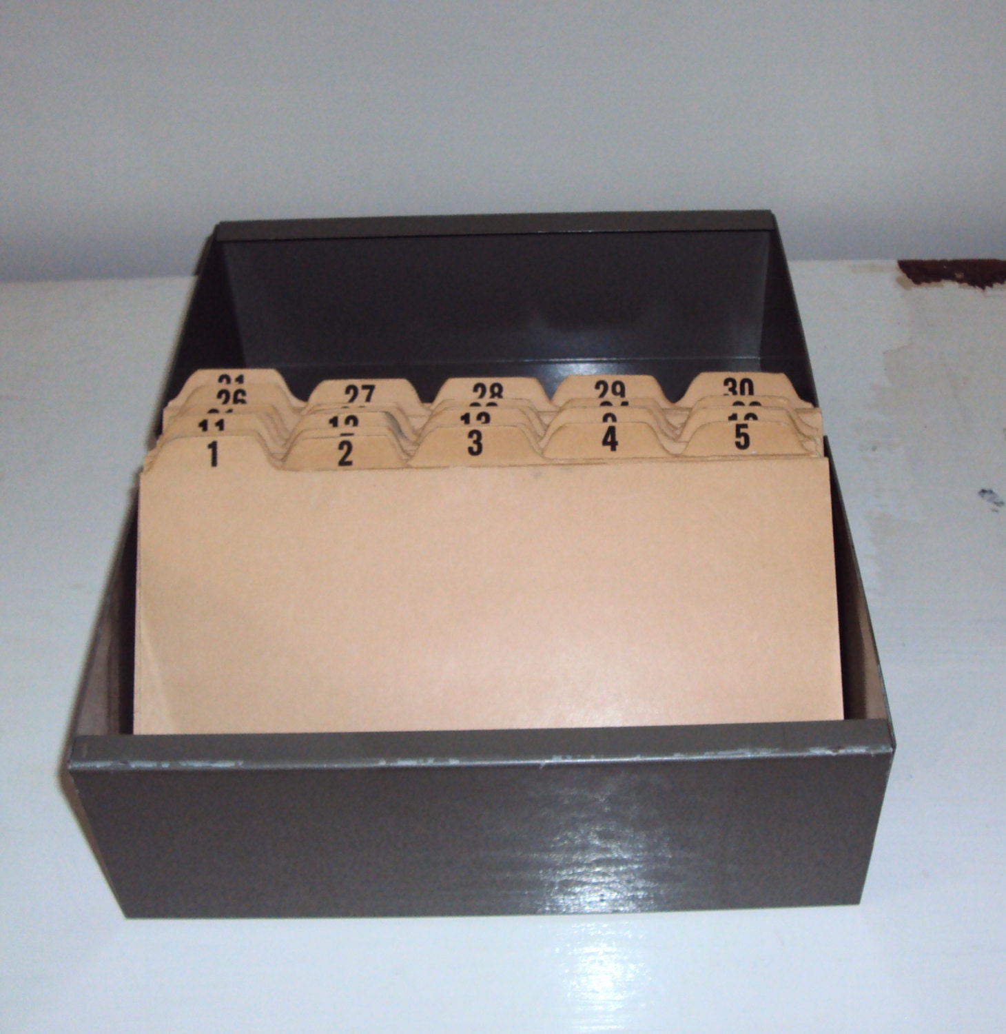 Fabulous VINTAGE INDUSTRIAL metal filing box with original dividers. Numbered 1 - 31. Recipie Box