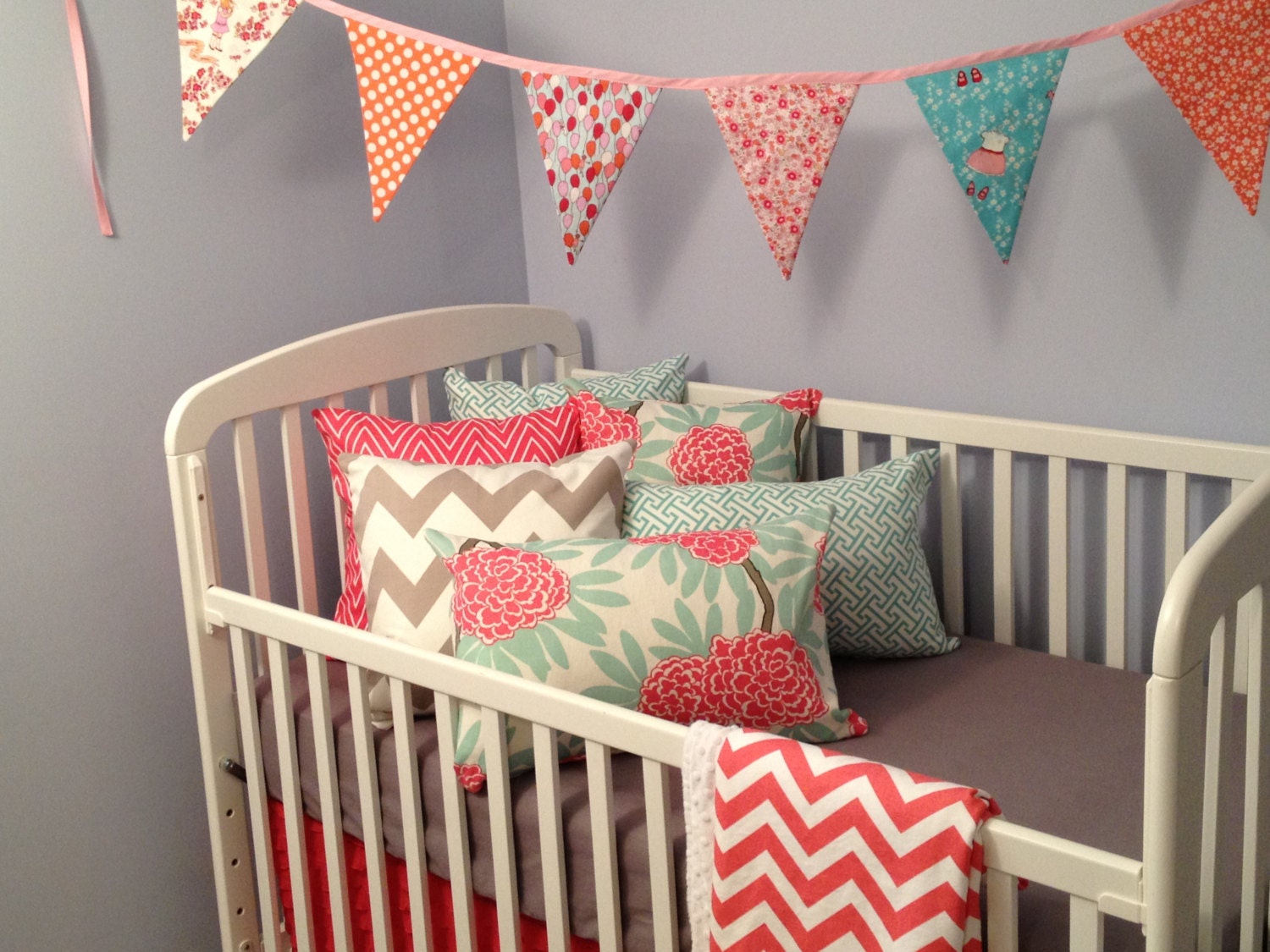 Coral and grey crib bedding