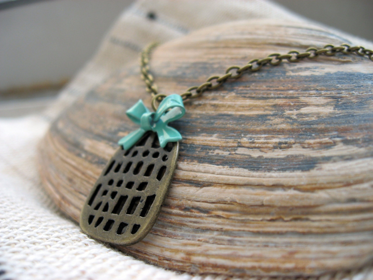 Bow and a Birdcage Necklace