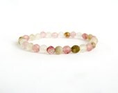 Reserved. small pink mixed stone bracelet with tourmaline, agate and gold stardust bead.  delicate.
