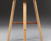 Stool made in sustainably sourced black walnut.