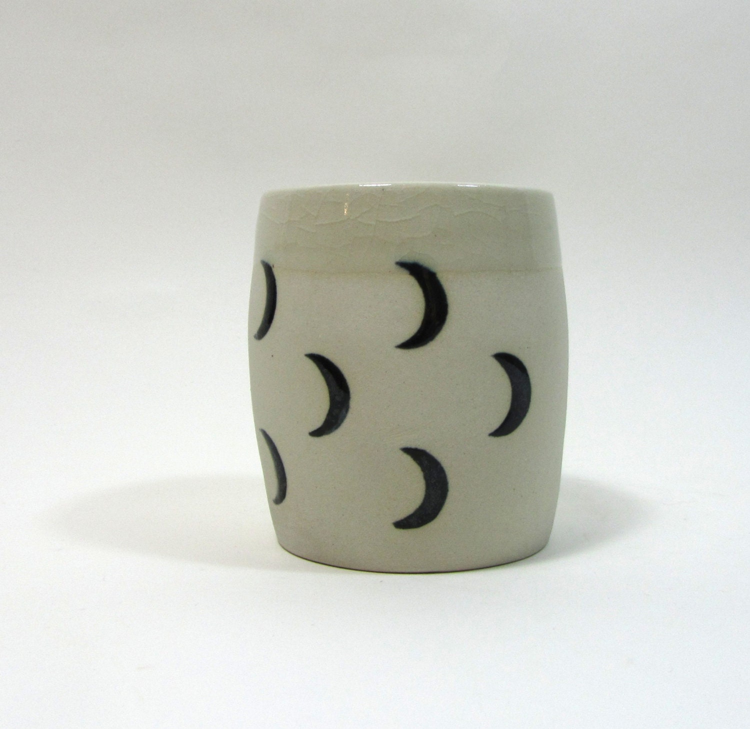 Crescent moon cup, unglazed with black moons