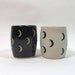 Pair of crescent moon cups, black and unglazed