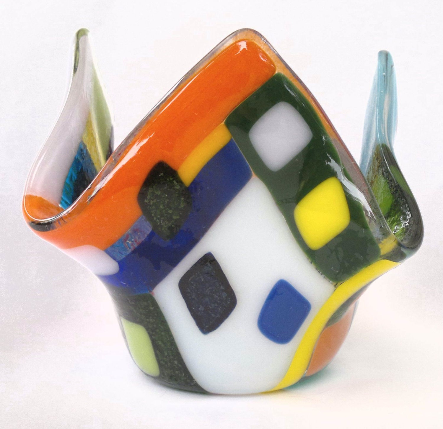 A colorful freeform small glass vase handmade by dalit glass