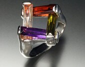 Multi-color sterling silver all in the same boat ring
