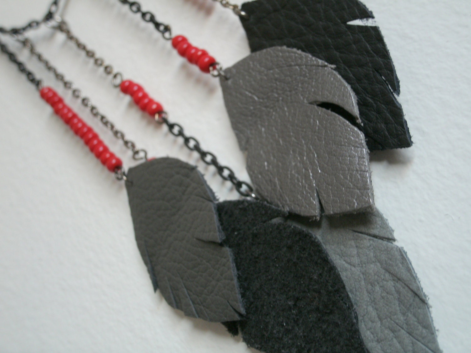 Long feather dangle necklace with red accent beads, handmade, one of a kind