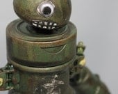 assemblage iron mercenary serious robot
