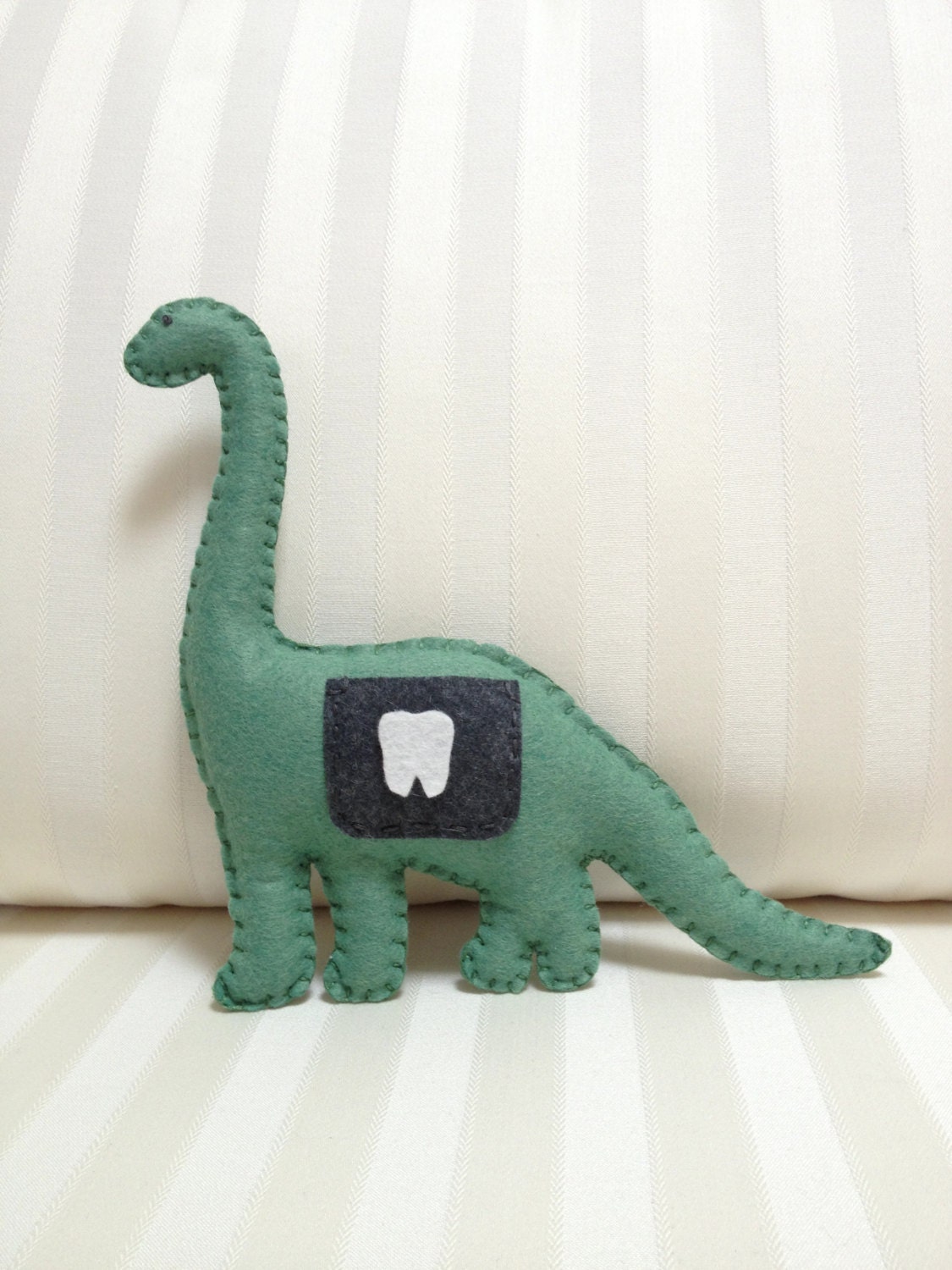 Big Dinosaur tooth fairy pillow 