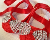 Red Baby shoes with diamond bows
