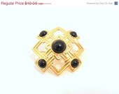 Monet Brooch - Gold Tone with Black Cabochons