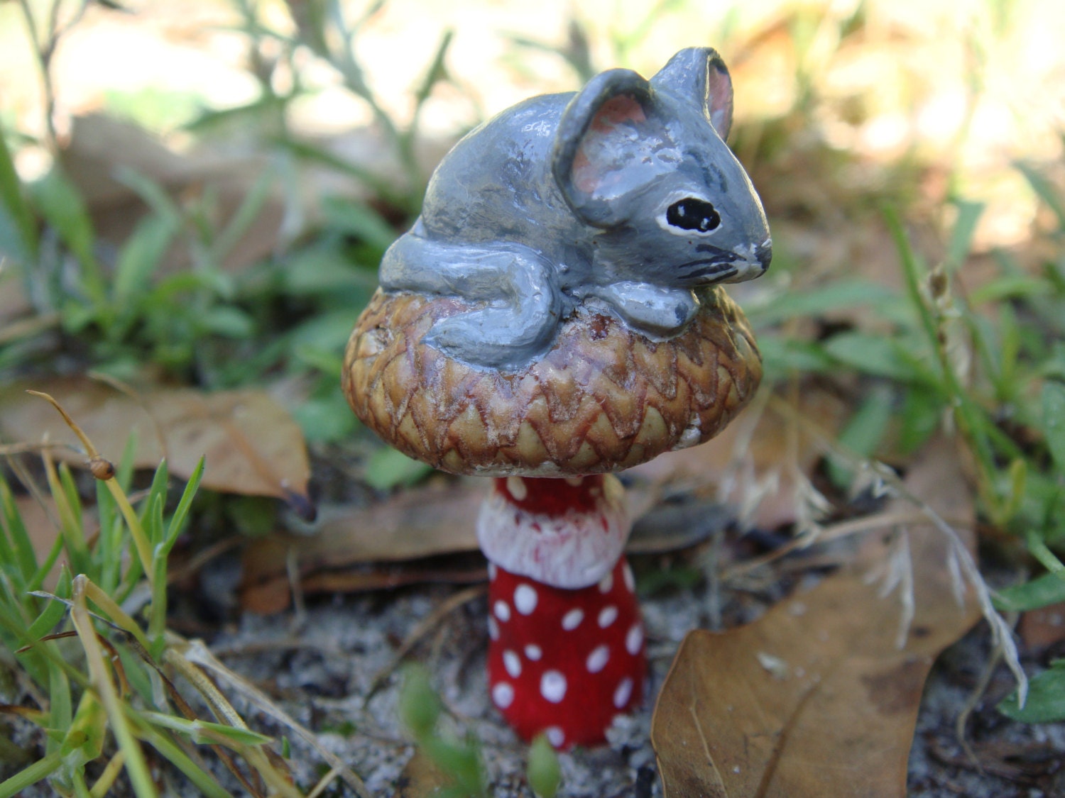 Hand sculpted paper clay miniature mouse on mushroom-netsuke