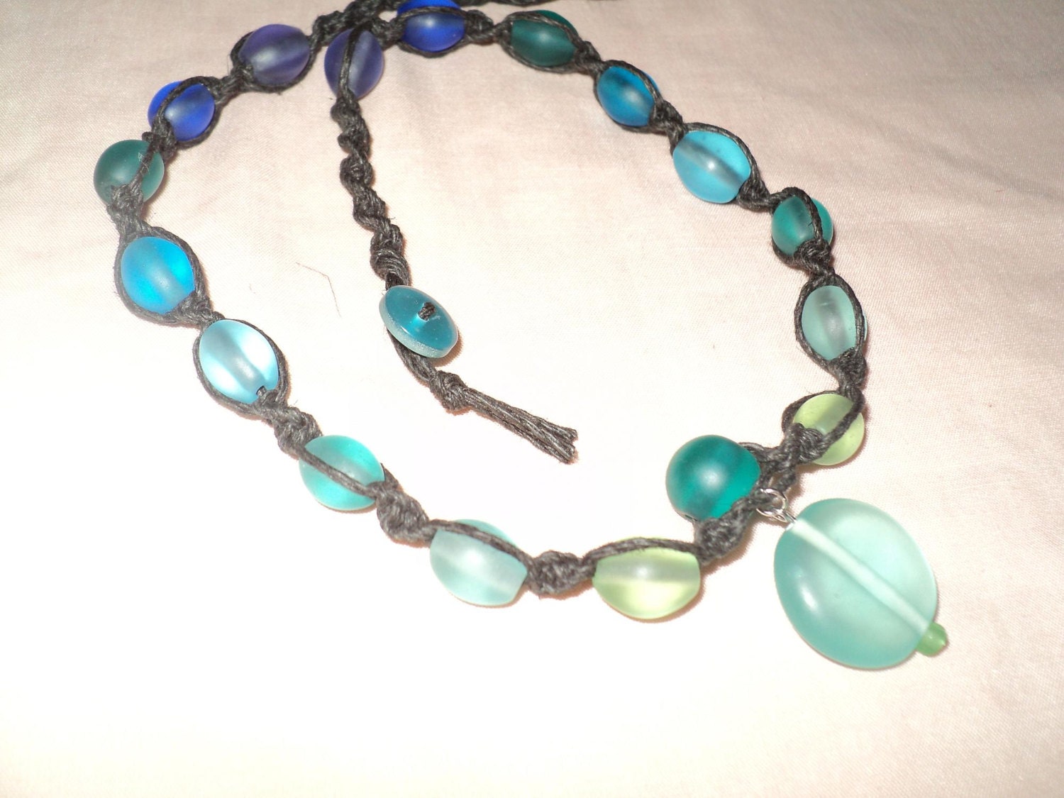 tHE dArK SeA black hemp necklace with frosted beach glass beads FREE SHIP TO U.S.:)