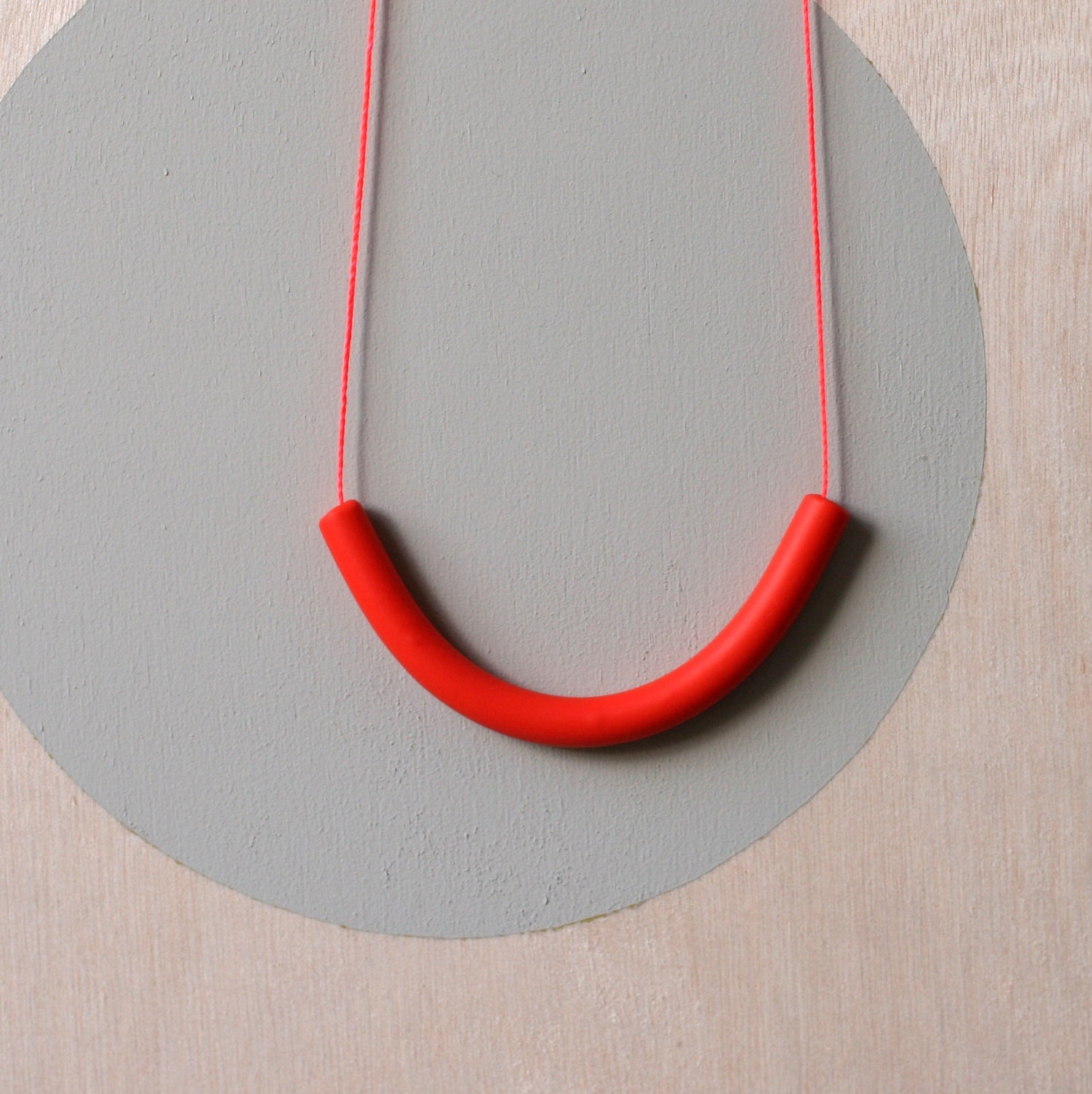 not quite a semi circle makes a necklace